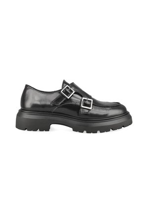 Black leather loafer with chunky sole and double silver buckle straps, side view on a white background.