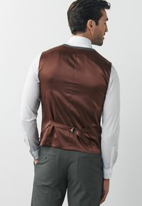 Next MOTION FLEX  - Strukirani kaput - grey