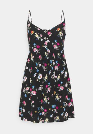 Robe noire sans manches avec fines bretelles, boutons à l'avant et motif floral multicolore en rose, blanc, bleu, jaune et vert.