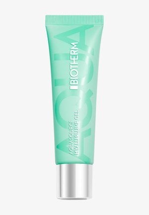Gel Biotherm Aquasource Hyalu Plump dans un petit tube vert menthe avec un capuchon argenté, texte blanc vertical sur le devant.