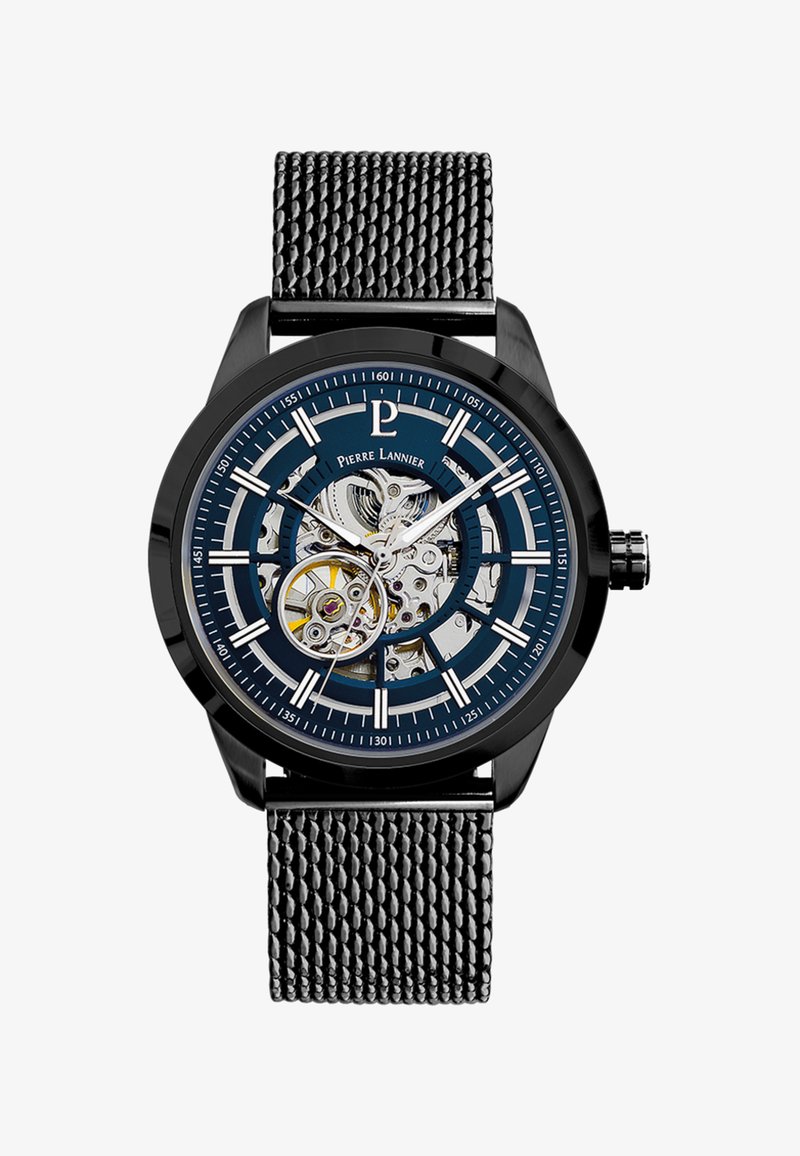 Melnā nerūsējošā tērauda pulkstenis ar sietu siksniņu. Zils skeleta ciparnīca atklāj sarežģītu mehāniku. Balti stundu atzīmējumi un rādītāji. 40 mm korpusa diametrs.