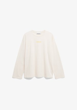 Long-sleeve, light beige t-shirt made of soft cotton. Features a round neckline and a small yellow logo text at the center.