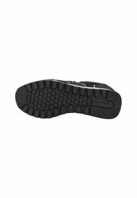 Sneaker nera con suola in gomma testurizzata dotata di grip circolari, cuciture rinforzate e marchio Tom's sul lato.