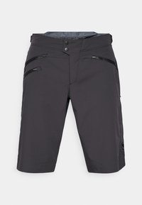 Pantalones cortos grises de corte ajustado, fabricados con material ligero. Incluye dos bolsillos con cremallera en la parte delantera y un parche de logo en la parte inferior de la pierna izquierda.