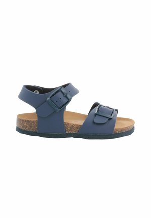 Sandali blu navy con due fibbie regolabili, soletta in sughero e suola in gomma texturizzata per una buona aderenza, con un design piatto e aperto sulla punta.