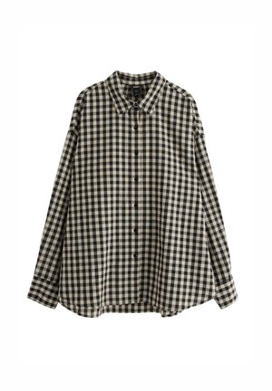 Camicia a quadri bianca e nera con maniche lunghe, colletto a punta e orlo arrotondato. Presenta chiusura frontale con bottoni e vestibilità comoda.