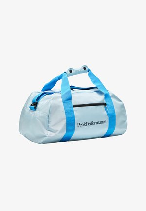 Lyseblå duffel taske med blå remme, med en lynlåslomme, logo på siden, og en afrundet form. Lavet af holdbart materiale.