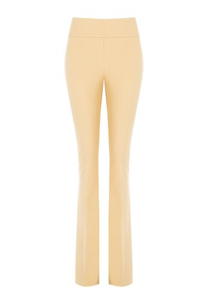 Hoge taille, uitlopende broeken in lichtgeel, gemaakt van rekbare stof. Gladde textuur zonder zichtbare patronen of hardwaredetails.