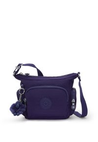 Fialová nylonová crossbody taška s hlavním prostorem na zip, přední kapsou, logem a huňatým přívěskem ve tvaru opice.