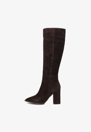 Brown suede knee-high boots with a pointed toe, textured surface, and a chunky block heel. Sleek, form-fitting design with minimal detailing.
