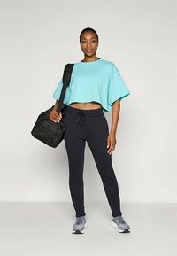 Stronger CROPPED - Marškinėliai su spaudiniu - basic turquoise