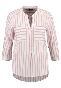 Blusa a maniche lunghe a righe verticali bianche e rosa con scollo profondo e due tasche frontali.