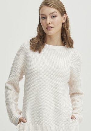 Texturiertes, hellrosa Strickpullover mit Rundhalsausschnitt und langen Ärmeln. Verfügt über seitliche Taschen und einen gerippten Saum. Weicher Stoff mit glatter Oberfläche.