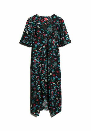 Czarna sukienka z kwiatowym nadrukiem w kolorze czerwonym, zielonym i niebieskim. Krótkie bufiaste rękawy, dekolt w kształcie litery V oraz talię ściągniętą z luźną spódnicą.
