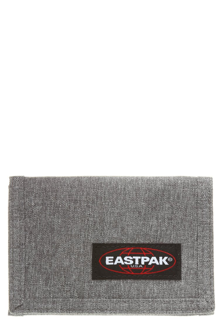 Grijze stoffen portemonnee met een gestructureerde afwerking, voorzien van een zwart Eastpak-logo op de voorkant. Compacte rechthoekige vorm met een minimalistisch ontwerp.