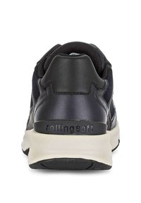 Sneaker nera con tomaia in pelle liscia, suola in gomma a contrasto e branding "rollingsoft" sul tallone. Forma arrotondata e colletto imbottito.