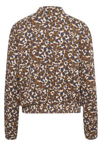 Långärmad skjorta med knappar i ett abstrakt djurmönster i brunt, marinblått och vitt, visad från baksidan.