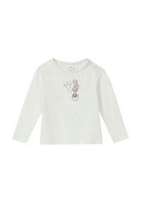 Langdurige witte blouse van zachte stof met een bedrukt ontwerp van een meisje op een eenwieler met de tekst "IK KAN ALLES DOEN." Twee drukknoopjes op de schouders.