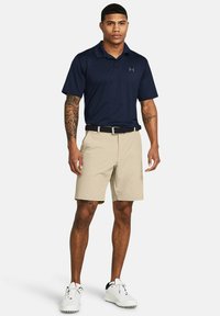 Under Armour MATCHPLAY TAPERED - Sporta šorti - khaki base