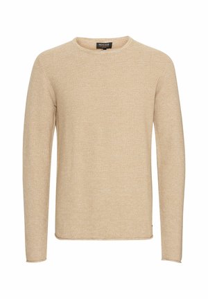 Maglione beige lavorato a maglia con scollo rotondo, maniche lunghe, tessuto testurizzato e un motivo delicato. Etichetta del marchio visibile al collo.