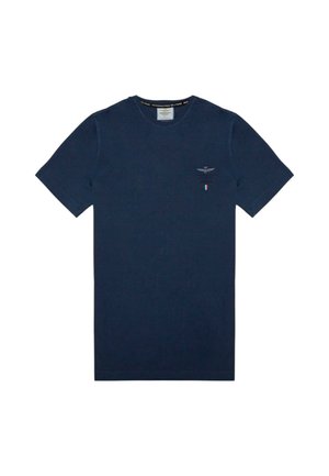 T-shirt in cotone blu navy con maniche corte, collo a giro, piccolo emblema sul lato sinistro del petto e accento della bandiera italiana vicino all'orlo.