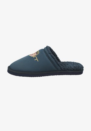 Navy blue slipper with a soft, textured interior and a smooth exterior. Features an embroidered logo on the upper and a thick sole.