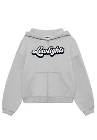 Světle šedá mikina na zip vyrobená z měkké tkaniny, s velkým černým vyšitým logem "Lowlights" na přední straně a předními kapsami.