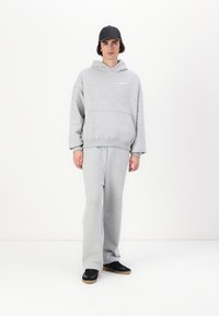 LOW LIGHTS STUDIOS® HOODIE UNISEX - Sweatshirt - grey melange