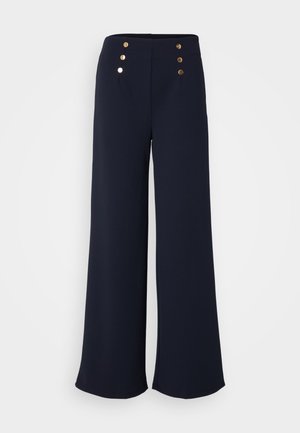 Pantalons à jambes larges bleu marine en tissu lisse, dotés de quatre accents de boutons dorés au niveau de la taille haute.