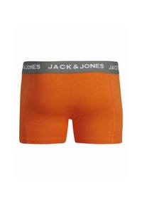Narancssárga pamut boxer alsónadrág szürke gumival, rajta fehér betűkkel a "JACK & JONES" felirattal. Simító felület és kényelmes illeszkedés.