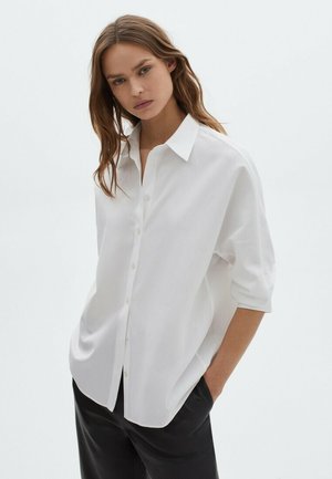 MIT RIPPENMUSTER - Chemisier - white