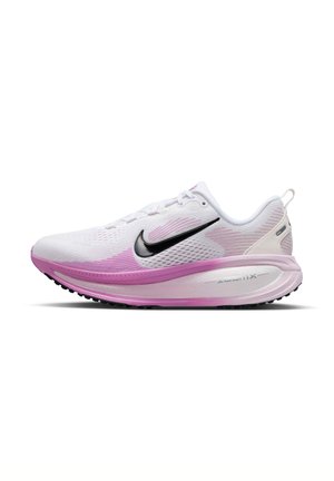 White and pink Nike running shoe with black swoosh logo and thick cushioned sole, shown from the side on a white background.