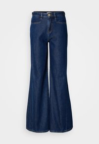 Jeans de ganga escura de perna larga com cintura alta, cinco bolsos e fecho de botão metálico. Textura suave e detalhes de costura subtil.