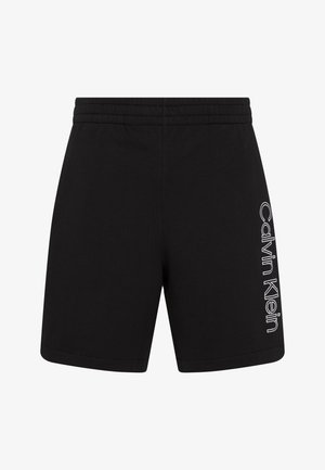 Short noir avec taille élastique et logo vertical blanc "Calvin Klein" imprimé sur le devant de la jambe droite.
