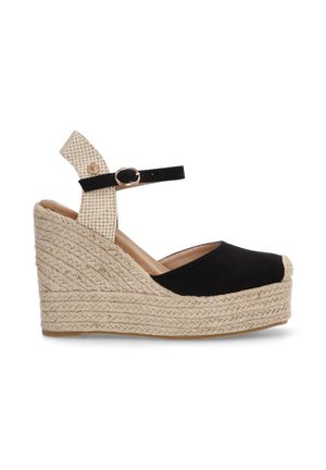 Sandalias de cuña de ante negro con plataforma de yute trenzado, correa en el tobillo a rayas beige y cierre de hebilla. Diseño de puntera redondeada.