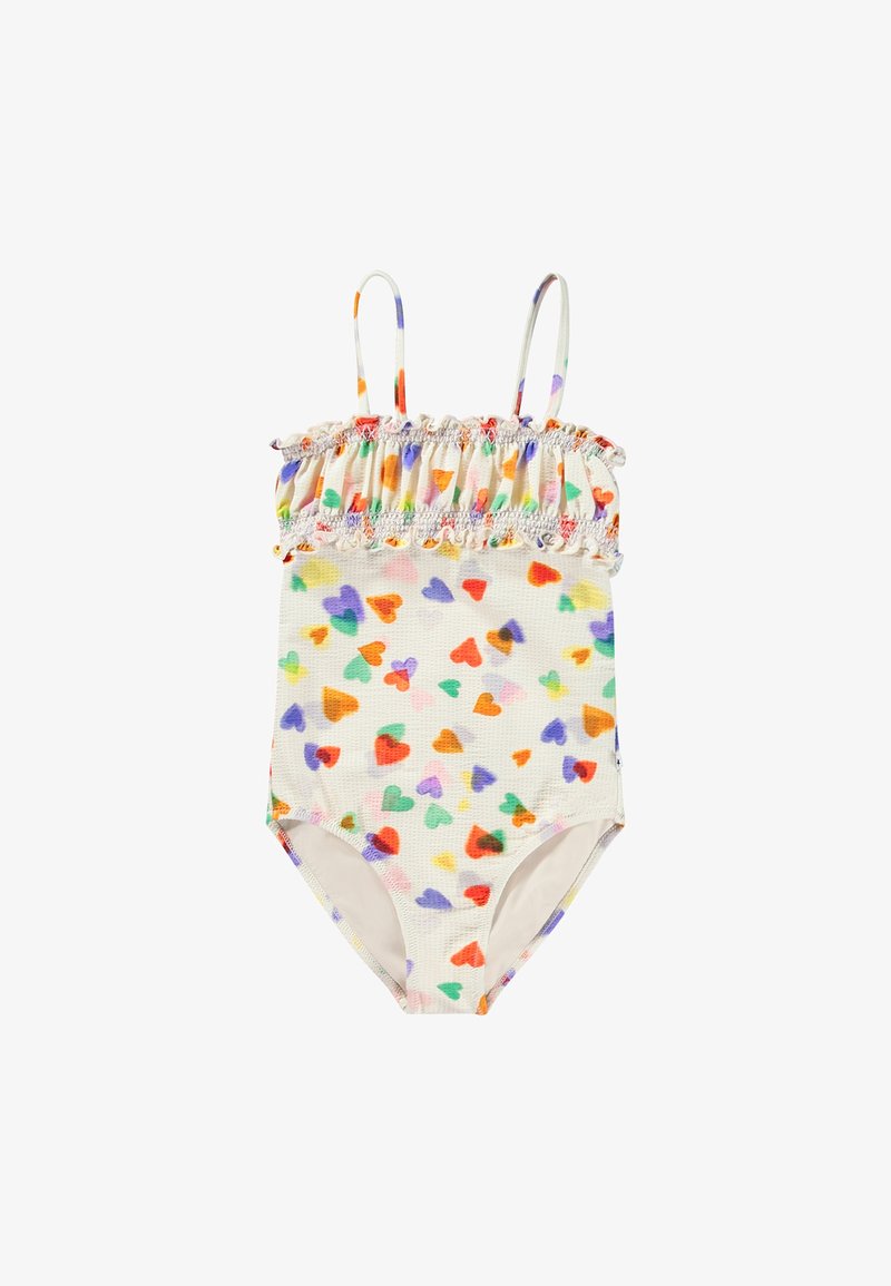 Swimsuit made of lightweight fabric, featuring a gathered smocked top, thin straps, and a multi-colored heart pattern on a cream background.