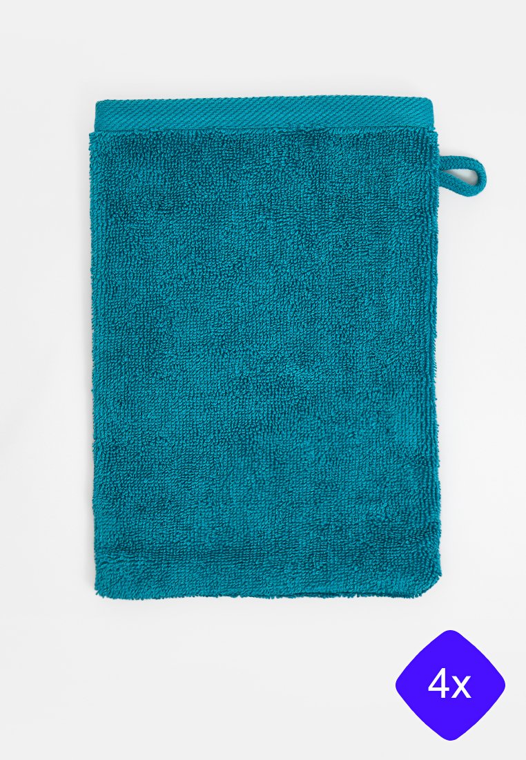 Serviette en coton teal avec une surface texturée, présentant une couleur unie et une boucle de suspension en haut. Pack de quatre indiqué dans le coin.