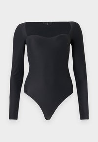 Bodysuit noir à manches longues avec encolure cœur, en tissu lisse, silhouette ajustée et décolleté haut au niveau des jambes.