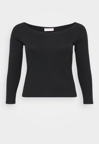 Musta pitkähihaine ribbineulepaita, jossa on laaja pyöreä pääntie ja tiukka siluetti, valkoista taustaa vasten.