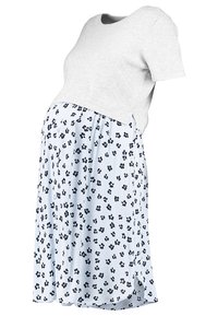 Robe de maternité avec un haut gris court et une jupe bleue à motif floral noir, fabriquée à partir d'un tissu doux et respirant.