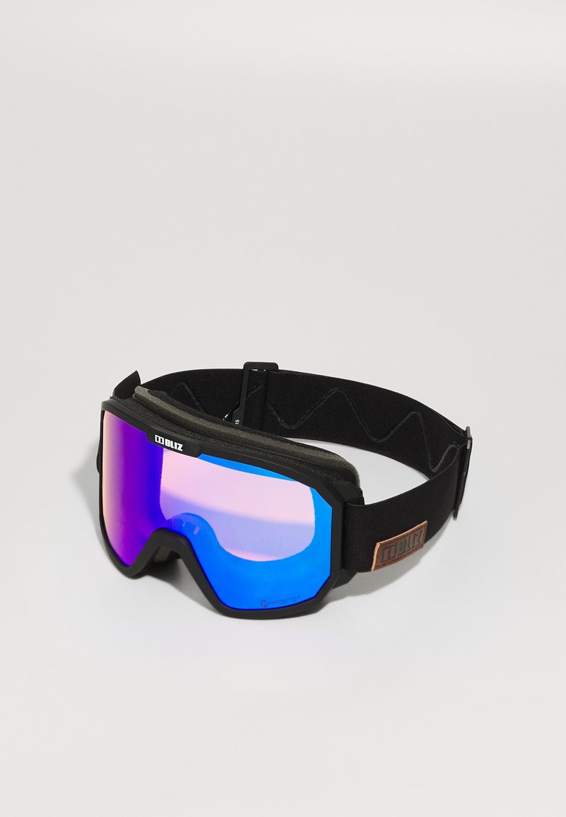 Ski goggles with a black frame, mirrored blue-pink lens, and foam padding. Adjustable black strap with a branded brown patch on the side.