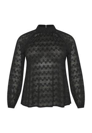 Bluză neagră din dantelă cu guler înalt, mâneci lungi raglan și margine rotundă. Prezintă un model zigzag stratificat și un fermoar la spate.