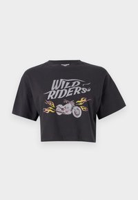 Cropped black t-shirt featuring "WILD RIDERS" text in silver and a motorcycle graphic with flame accents in orange and yellow.