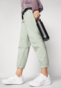 Nike Performance DRI-FIT FAST - Treniņtērpa apakšdaļas - jade horizon