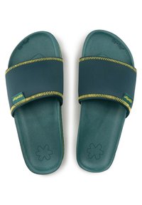 Green slide sandals with a textured rubber sole, featuring a smooth strap with yellow stitching and a small brand tag in the side.