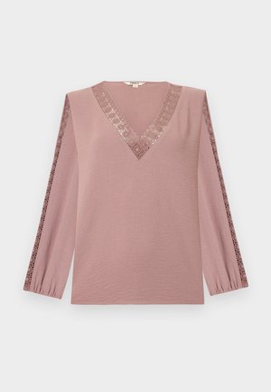 Μπλούζα με μακριά μανίκια σε σκούρο ροζ, με βαθύ V-λαιμόκοψη και διακοσμητικό δαντέλα στα μανίκια. Κατασκευασμένη από μαλακό, υφή υφάσματος.
