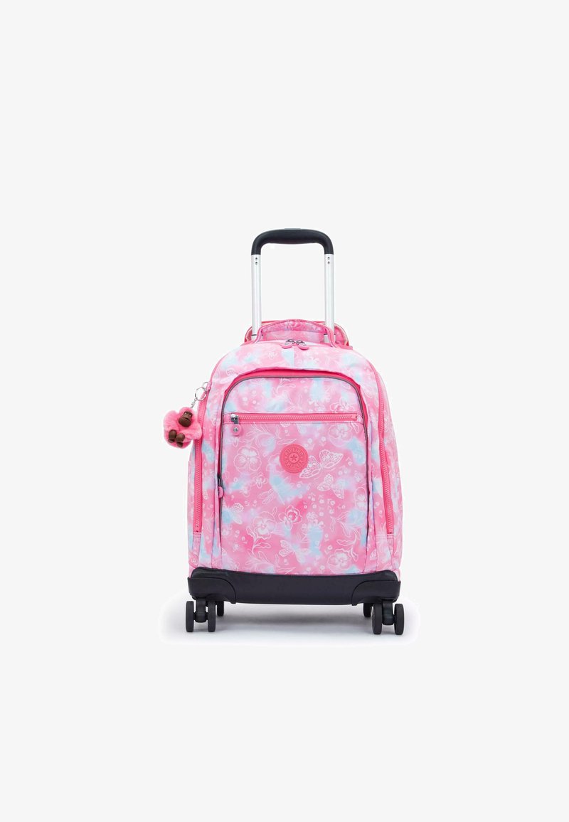 Valigia rosa con ruote, decorata con motivi floreali e farfalle, dotata di una base nera, manico argentato e un charm peloso attaccato.