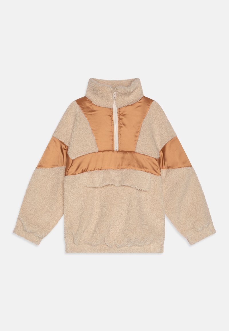 Beige pullover with a high collar, featuring a half-zip closure and contrasting satin fabric in a caramel color on the chest and shoulders.