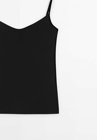 Débardeur noir à fines bretelles, décolleté en V et design ajusté. Fabriqué à partir d'un matériau lisse, offrant un look épuré et minimaliste.