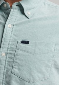 Superdry & Co OXFORD SHORT SLEEVE - Camisa - sage green